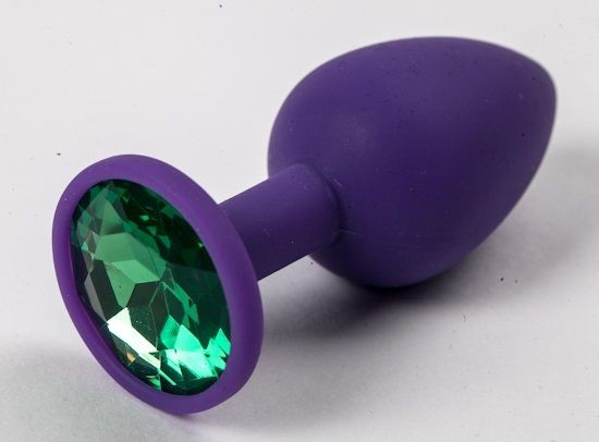 Фиолетовая силиконовая анальная пробка с зеленым стразом - 7,1 см. от 4sexdreaM
