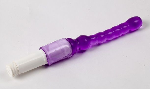 Фиолетовый анальный стимулятор с вибрацией - 23,5 см. от White Label