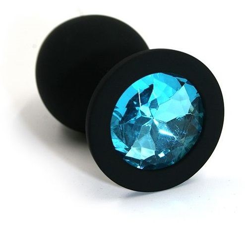 Чёрная силиконовая анальная пробка с голубым кристаллом - 7 см. от Kanikule