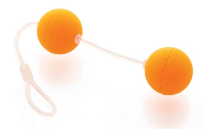 Оранжевые вагинальные шарики на прозрачной сцепке от Sexus