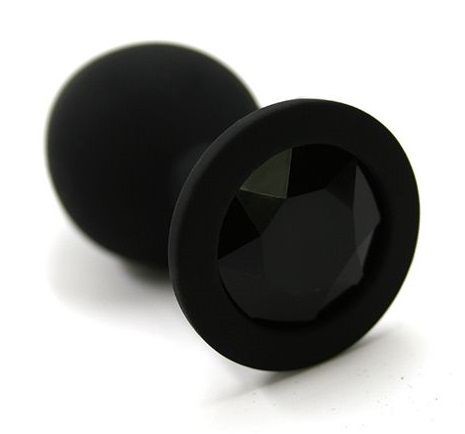 Чёрная силиконовая анальная пробка с чёрным кристаллом - 7 см. от Kanikule