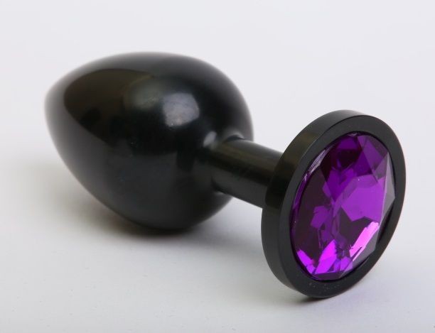 Чёрная анальная пробка с фиолетовым стразом - 7,6 см. от 4sexdreaM