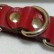 Красные ременные наручники с полукольцом от Подиум