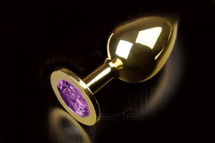 Большая золотая анальная пробка с закругленным кончиком и фиолетовым кристаллом - 9 см. от Пикантные штучки